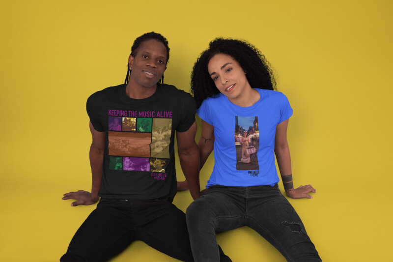 crew-neck-t-shirt-mockup-of-a-couple-sitting-at-a-studio-30763